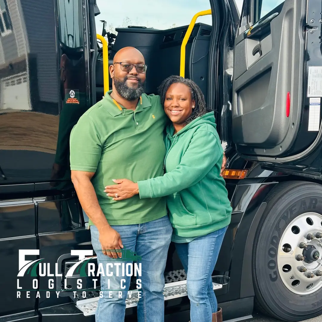 Steven and Javela Singleton, founders of Full Traction Logistics, beside their truck